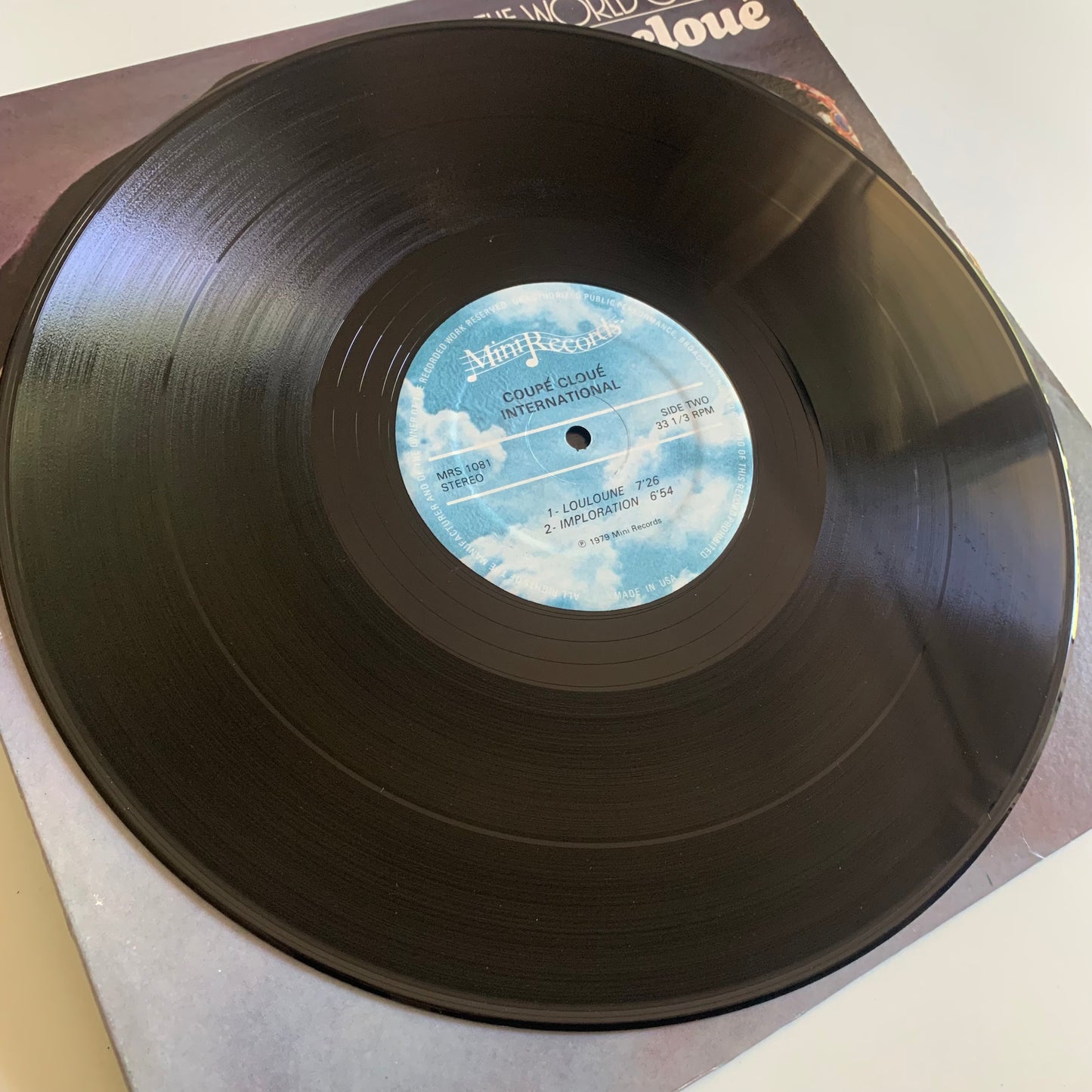 Coupé Cloué - The World Of Coupé Cloué (L'International) - LP 1979 Occasion