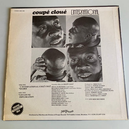 Coupé Cloué - The World Of Coupé Cloué (L'International) - LP 1979 Occasion