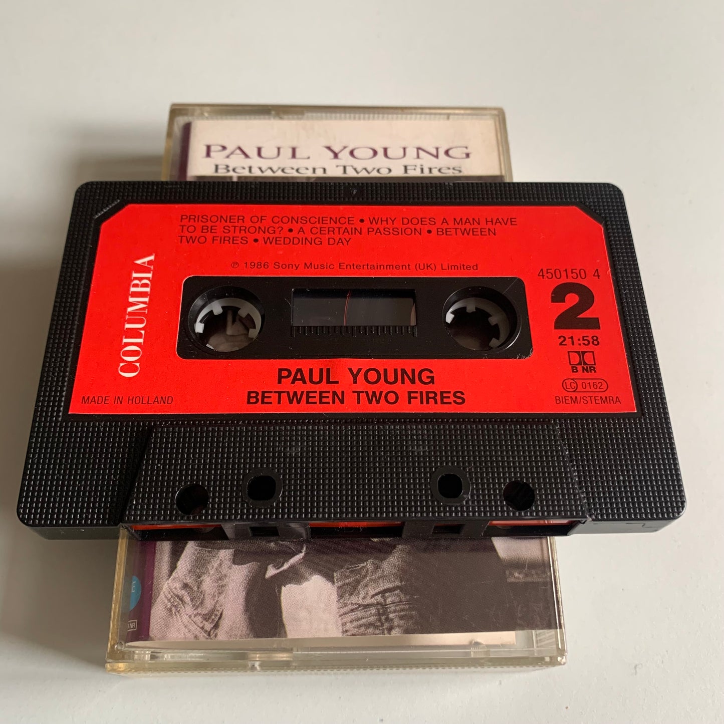 Paul Young - Between Two Fires - Occasion