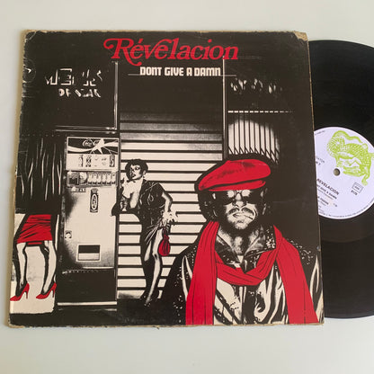 Revelacion - Don't Give A Damn / Living It Up - Single 1982 Occasion