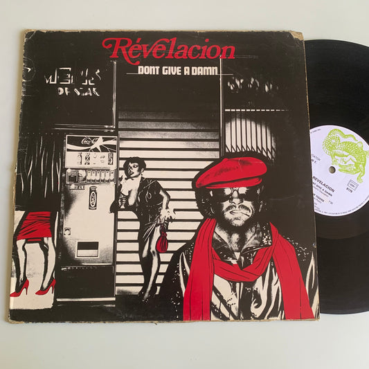 Revelacion - Don't Give A Damn / Living It Up - Single 1982 Occasion